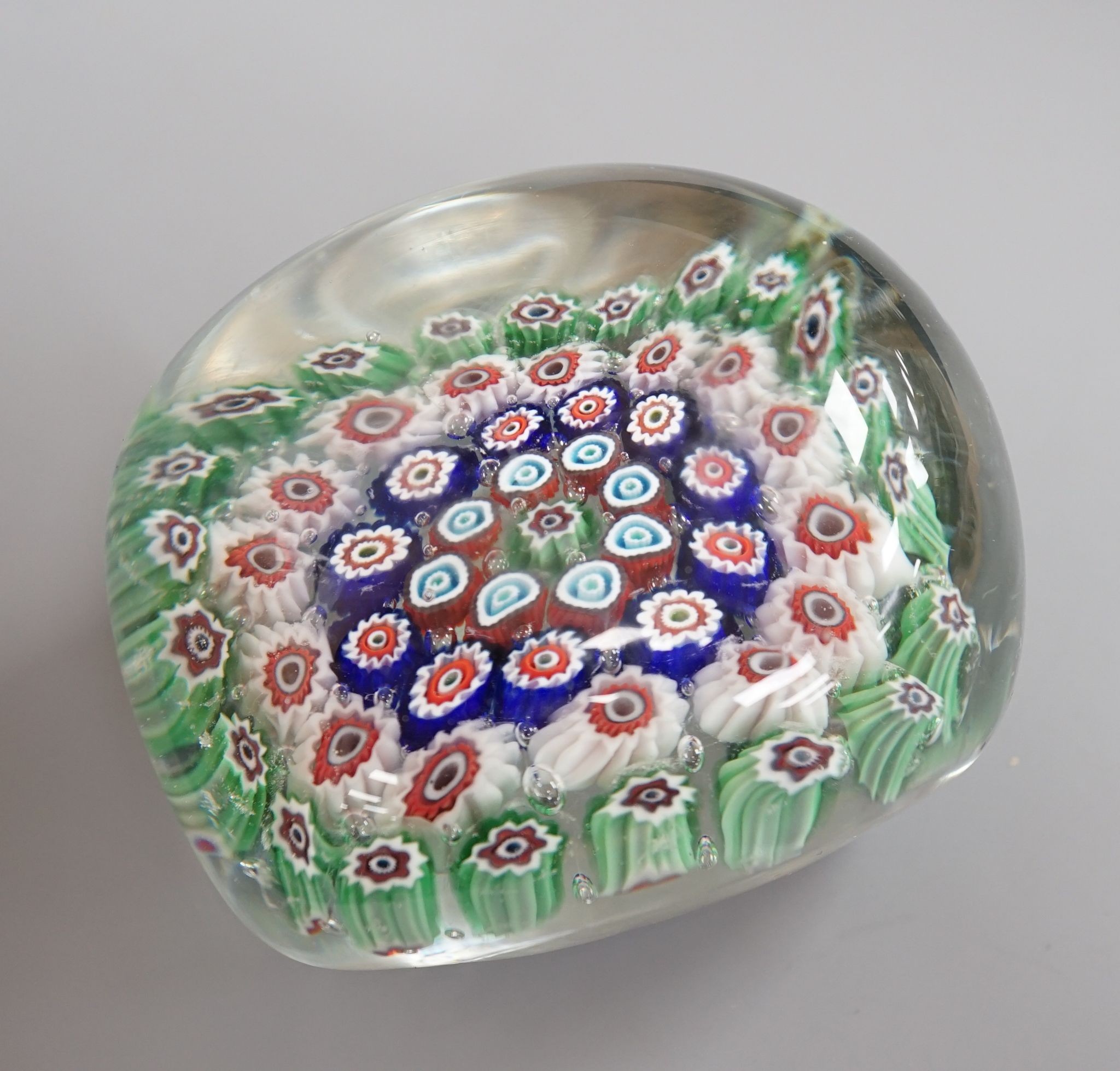 An unusual rectangular millefiori glass paperweight, probably Murano, 9.4cm